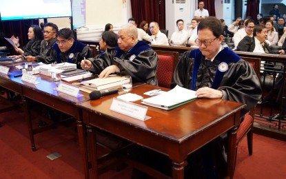 <p><strong>ORAL ARGUMENTS.</strong> State lawyers led by Solicitor General Menardo Guevarra (right) defend the transfer of Philippine Health Insurance Corp. funds to the national treasury during oral arguments before the Supreme Court in Manila on Tuesday (Feb. 4, 2025). Guevarra said the fund transfer was within legal bounds, and for important government programs and projects to continue without resorting to debt. (<em>PNA photo by Ben Pulta)</em></p>