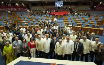 <p><strong>ADJOURNED.</strong> Speaker Martin Romualdez, Senior Deputy Speaker Aurelio Gonzales Jr., Majority Leader Manuel Jose Dalipe, Senior Deputy Majority Leader Sandro Marcos, Minority Leader Marcelino Libanan and other lawmakers join for a group photo following the adjournment of sessions at the plenary hall of the House of Representatives on Wednesday night (Feb. 5, 2025). Before adjourning the session, the House endorsed to the Senate the impeachment complaint against Vice President Sara Duterte with the signature of 215 House members.<em> (Photo courtesy of the House Press and Public Affairs Bureau)</em></p>