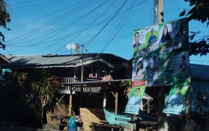 <p><strong>POSTER AREA.</strong> Campaign materials hang from a Comelec-designated poster area in Dumaguete City, Negros Oriental during the 2023 Barangay and Sangguniang Kabataan elections. The poll body will undertake “Oplan Baklas” (dismantle) on Tuesday (Feb. 11, 2025) at the start of the campaign period for national candidates. <em>(PNA file photo by Judy Partlow)</em></p>