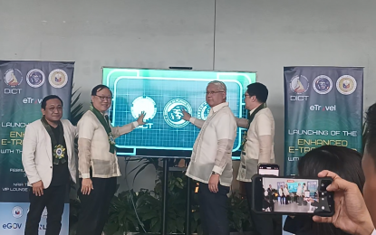 <p><strong>FASTER PROCESSING.</strong> DICT Secretary Ivan John Uy and CFO Secretary Dante Ang II lead the official launch of the enhanced e-Travel app with the integration to the CFO system at the NAIA Terminal 3 on Friday (Feb. 28, 2025). Ang said the enhanced e-Travel app would provide a more efficient immigration process to Filipino travelers.<em> (PNA photo by Marita Moaje)</em></p>