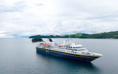 The cruise ship Heritage Adventurer spotted near Daram Island in Samar on Monday (June 16, 2025). The Department of Tourism has welcomed the first visit of a cruise ship in Samar as it puts the province on the country’s cruise expedition map.
