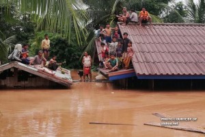 2 confirmed dead, more missing after dam collapses in Laos