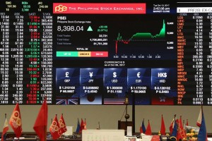 Peso gains ground, local stock retreat 