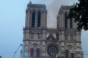 Spire of Notre Dame Cathedral in Paris collapses in huge fire