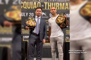 Pacquiao takes WBA super welterweight belt from Thurman