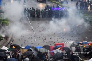 Violent protests in Hong Kong hit economy hard 