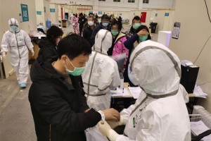 Death toll in China’s coronavirus outbreak rises to 909