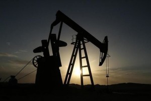 Oil prices drop with crude inventory build in US