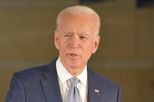 Biden to require walking boot after spraining foot