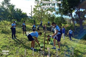 Soccsksargen cops, partners plant 35K trees