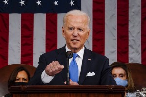 Biden signs law to curb anti-Asian hate crimes amid pandemic