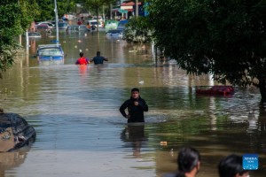 Malaysia flood evacuees rise to 64K, 8 deaths reported