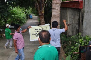 DENR, Comelec tear down posters nailed on trees in Isabela