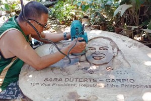 CDO artist's woodwork features VP Sara