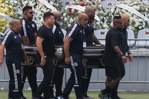 Pele’s coffin arrives at Santos stadium ahead of funeral rite