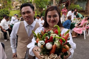 Brides flex 'veggie bouquets' at Cavite mass wedding