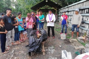 Remains of NPA rebel exhumed a year after death in Davao Oro