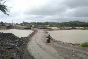 Destroyed Antique river crossing passable anew after ‘quick fix’