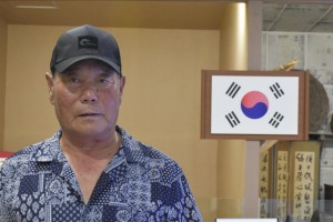 Despite strained relations, locals long for united Korea