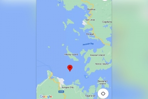 PCG rescues 8 from half-submerged motor banca in Surigao City