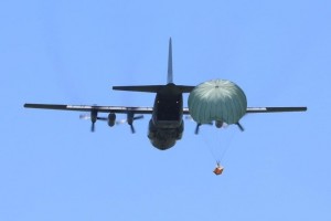 Pacific Airlift Rally participants hold 'LCLA' airdrop drills