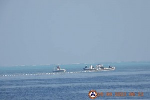 Floating barriers at Scarborough Shoal violate PH sovereignty - DFA