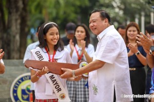 Young boy, girl officials run Iloilo city hall offices