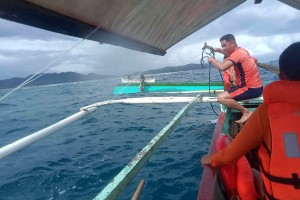 PCG saves 3 in Surigao Sur town sea mishap