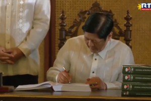 Marcos signs 5 new laws