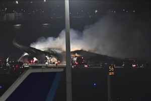 Japan begins probe into planes collision at Tokyo airport