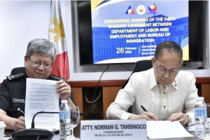 DOLE, BI ink pact on sharing of foreign workers' data