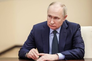 Putin calls on Russians to take part in presidential polls