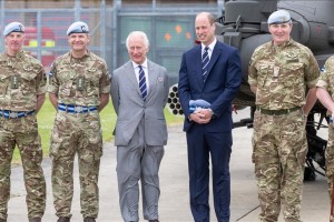 Britain's King Charles hands over military role to William