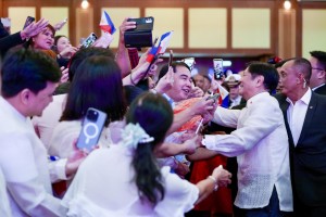 Marcos vows retraining program for returning OFWs 