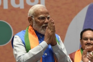 India's Modi keeps key ministers, indicating policy continuity