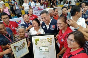 First Lady awards PHLPost centenarian stamps at LAB for ALL Caravan