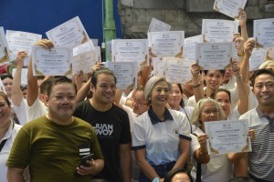 Manila awards lot certificates to 133 Tondo residents