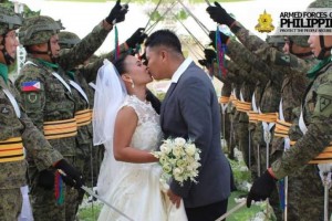 Ex-rebels in northern Negros tie knot in military-style wedding