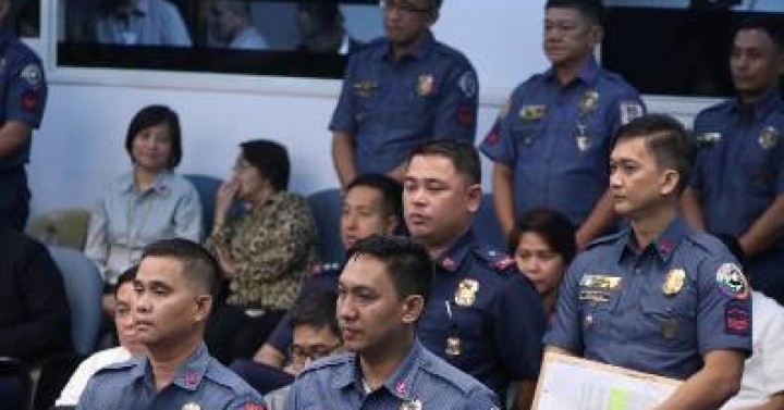 'Ninja cops' plead not guilty to raps over 2013 drug raid | Philippine ...