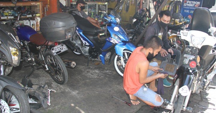 Moto repair shop | Photos | Philippine News Agency