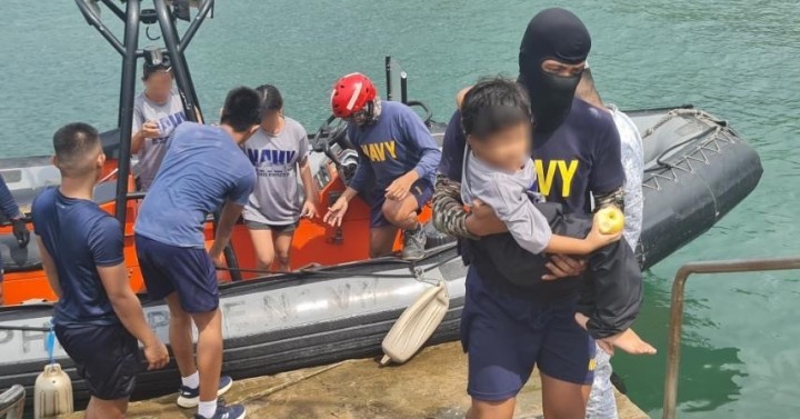 6 passengers rescued from distressed motorboat off Palawan | Philippine ...