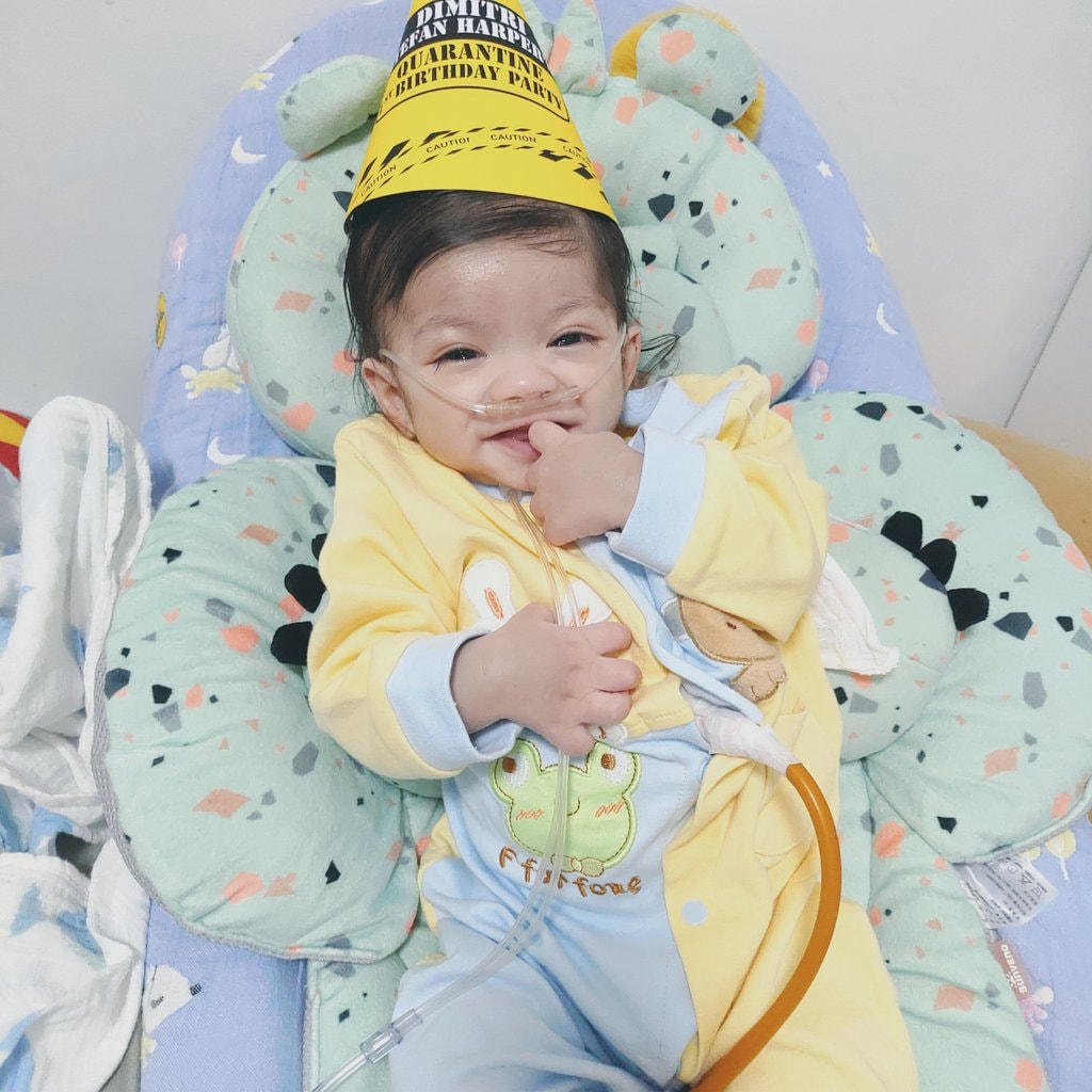 HAPPY BABY. Despite his health condition, Dimitri manages to smile during the celebration of his first birthday on Jan. 5. (Photo courtesy of Hyron Manalaysay)