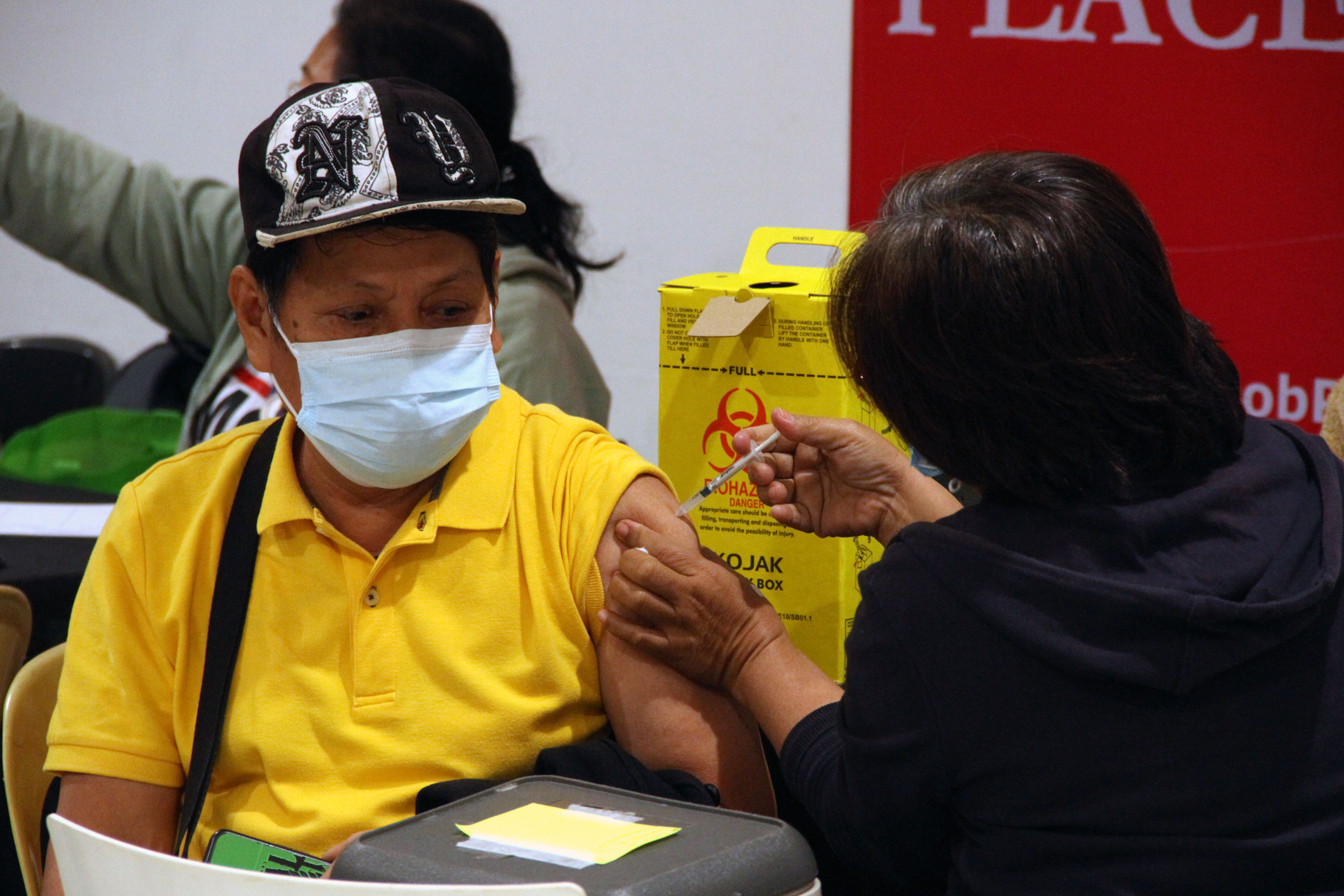 A Senior Citizen Receives Bosstesshot Of Covid 19 Vaccine Photos 