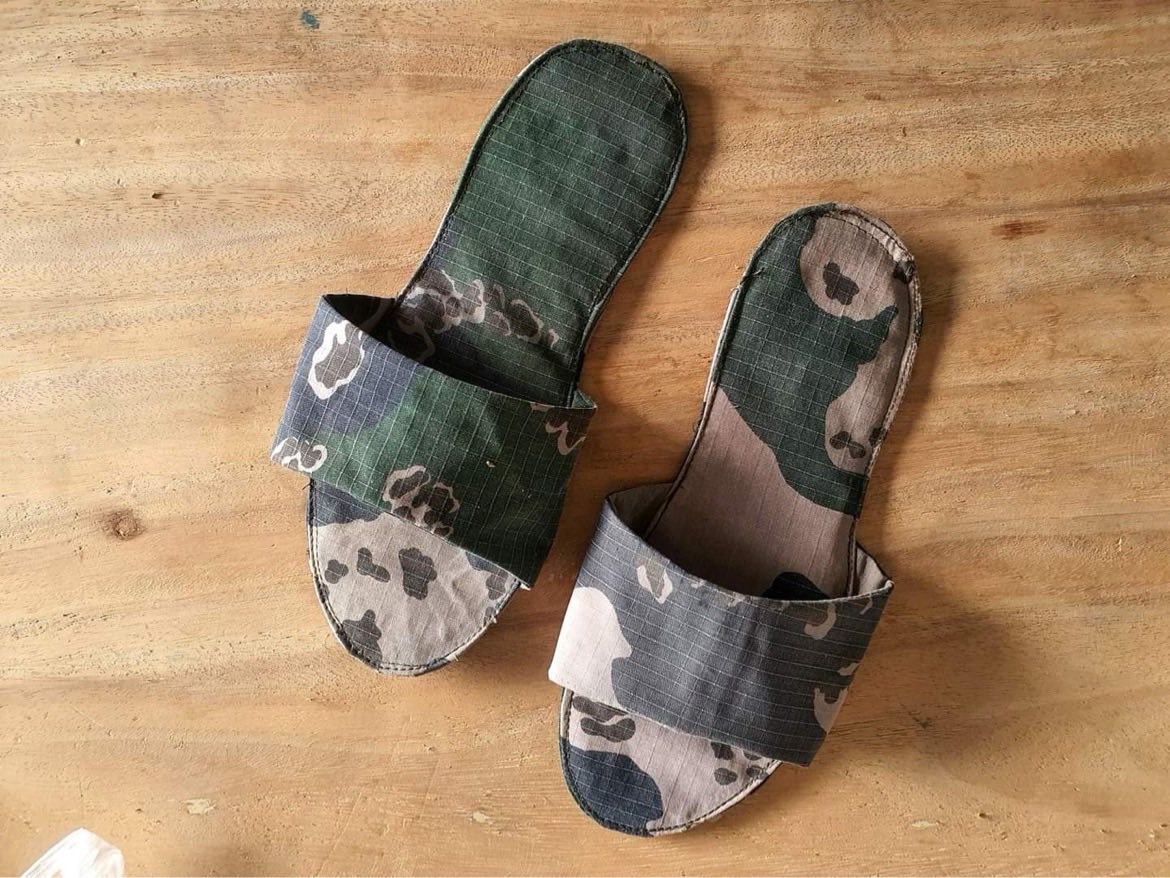 A pair of slippers made from fatigue uniform