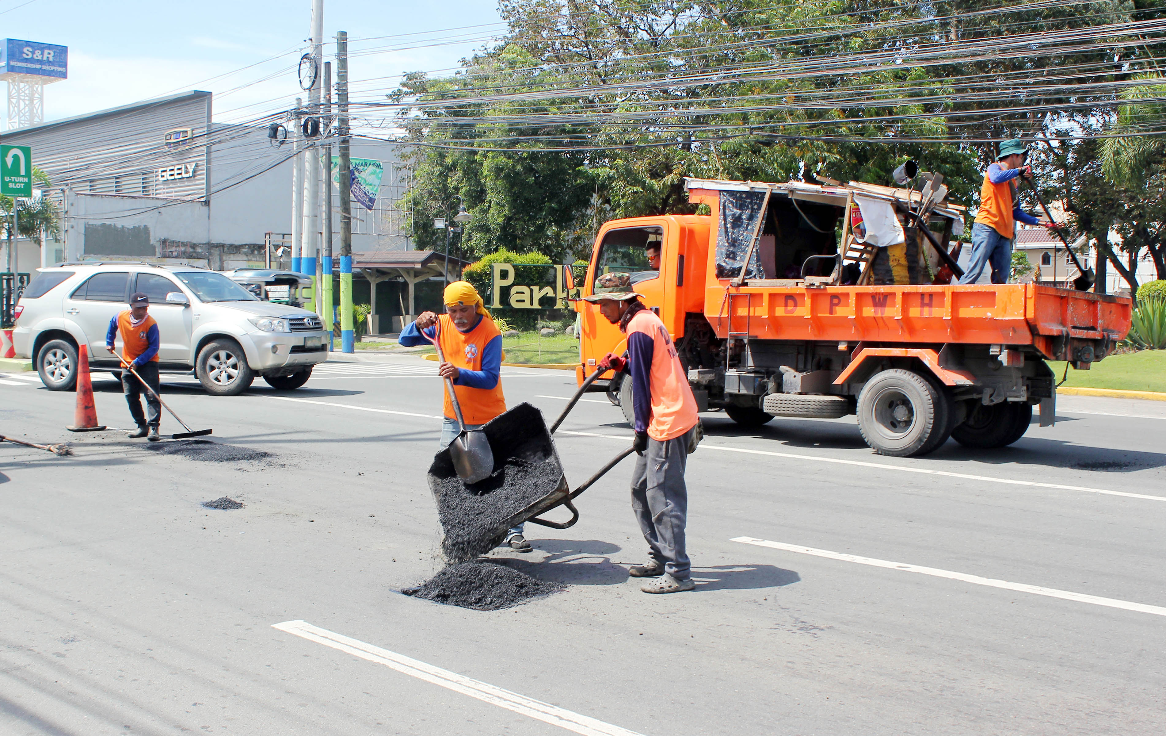 ROAD REPAIR | Photos | Philippine News Agency