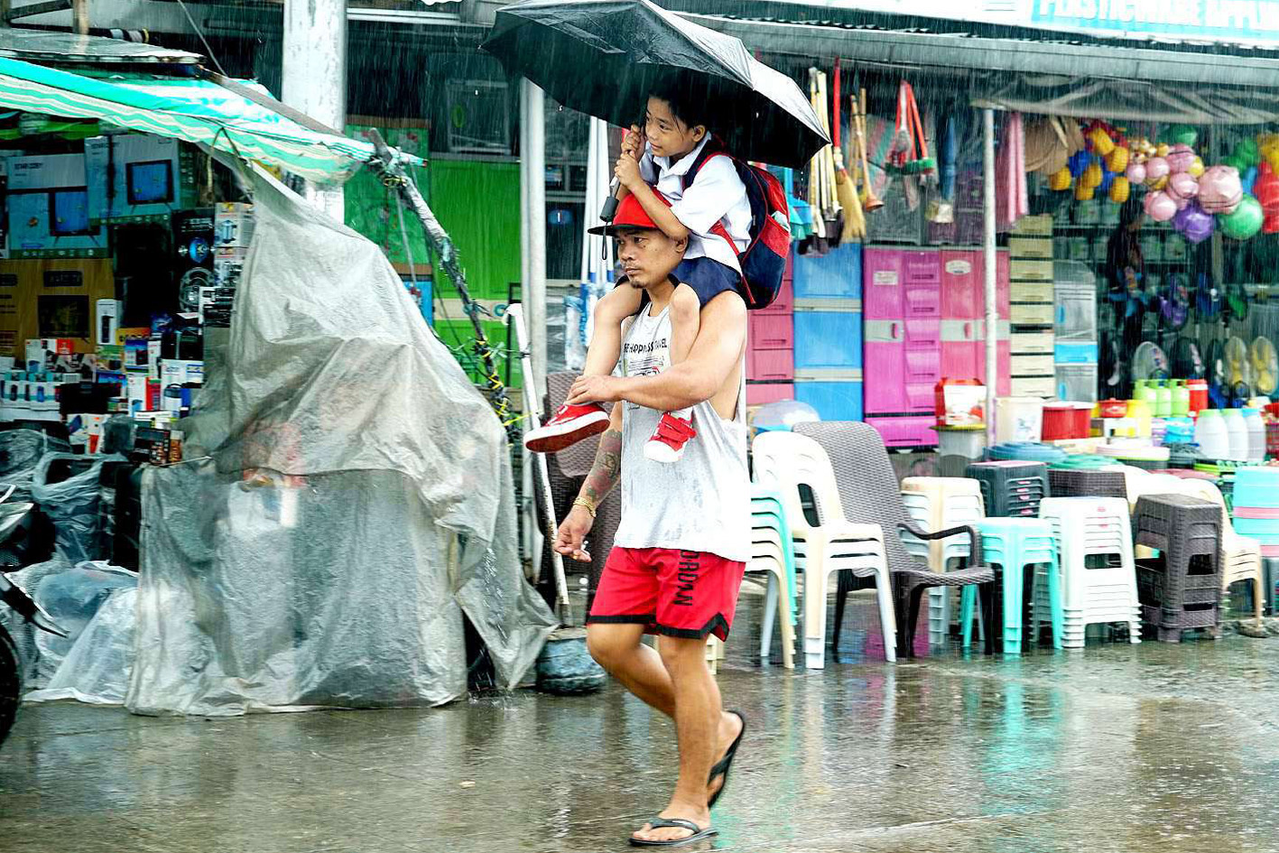 RAINY WEATHER Photos Philippine News Agency